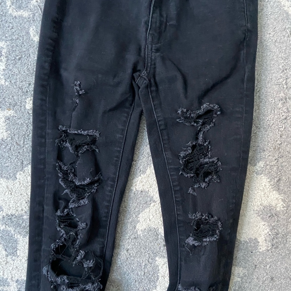 black ripped jeans